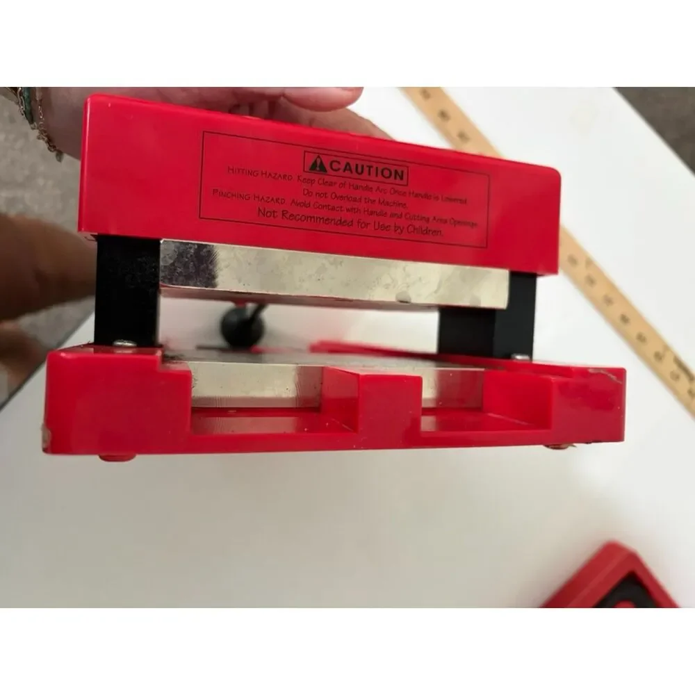 Red Sizzix original personal die cutter machine